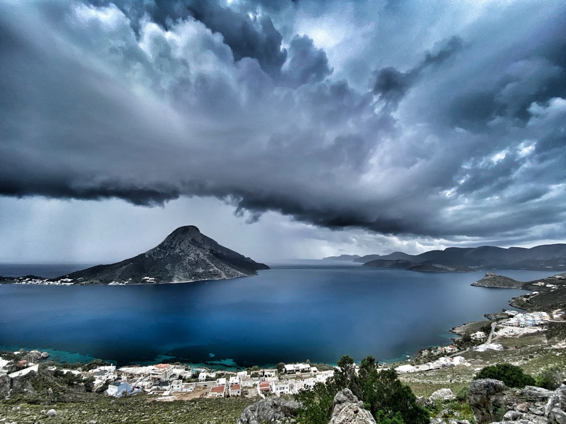 Storm clouds above the Kalymnos coastline and bay.